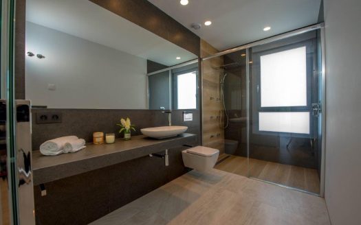 Newly built villa with modern design and materials and luxury finishes.